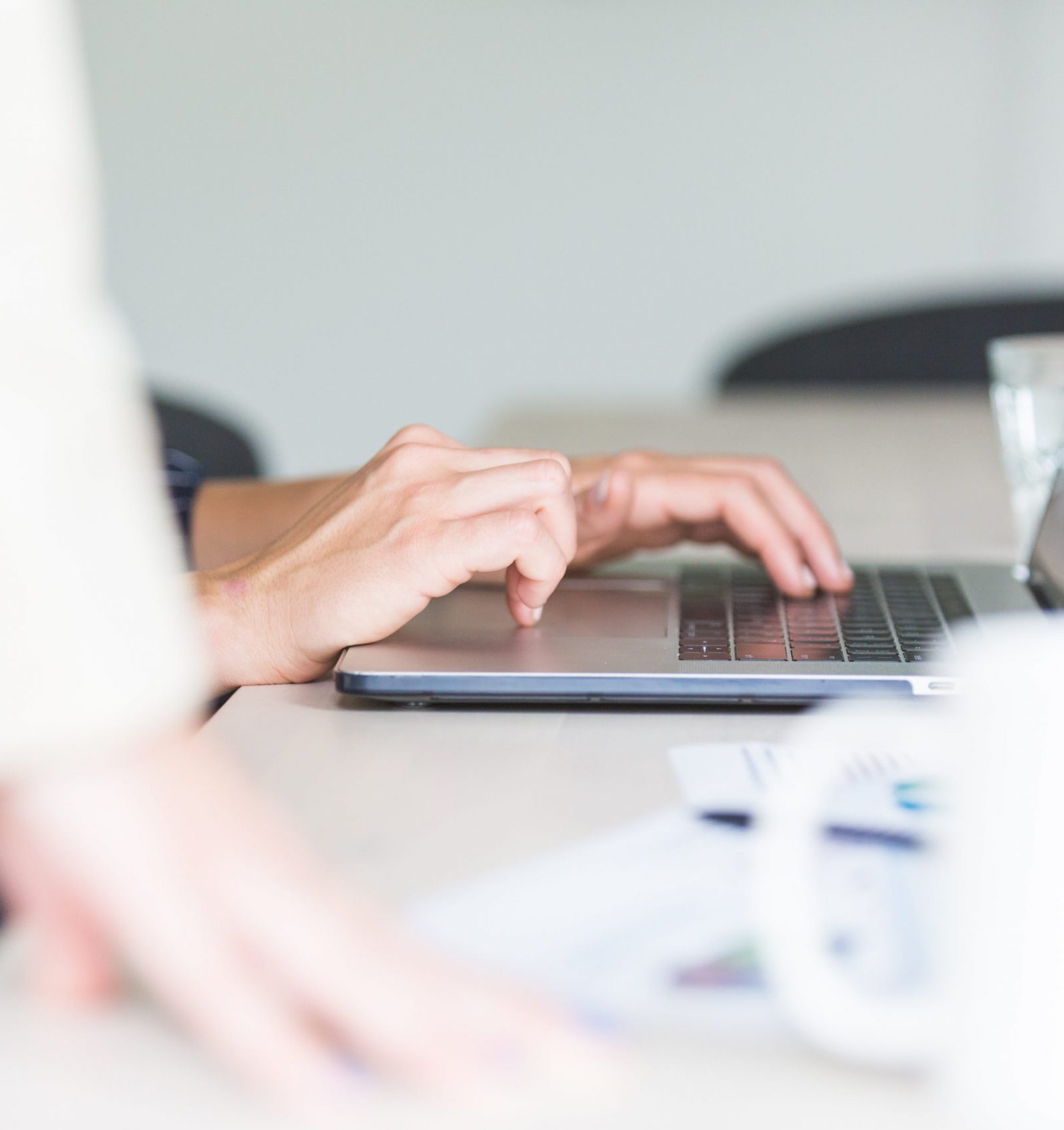 hands-using-computer-in-office